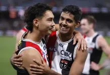 MELBOURNE, AUSTRALIA - APRIL 08: Mitch Owens and Nasiah Wanganeen-Milera of the Saints embrace after  the round four AFL match between St Kilda Saints and Gold Coast Suns at Marvel Stadium, on April 08, 2023, in Melbourne, Australia. (Photo by Darrian Traynor/Getty Images)