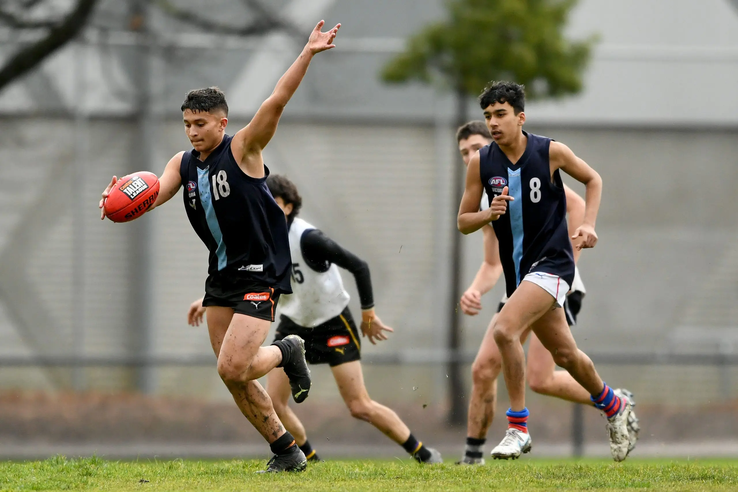MELBOURNE, AUSTRALIA - JUNE 28: Adam Sweid of Vic Metro kicks during the Victorian Diversity All-Stars U18 Boys match between Vic Country and Vic Metro at Warrawee Park on June 28, 2023 in Melbourne, Australia. (Photo by Josh Chadwick/AFL Photos/AFL Photos via Getty Images)