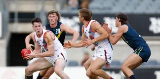 MELBOURNE, AUSTRALIA - APRIL 13: Cooper Keogh of the Coburg Lions in action during the 2024 AFL Academy match between the Marsh AFL National Academy Boys and Coburg Lions at Ikon Park on April 13, 2024 in Melbourne, Australia. (Photo by Michael Willson/AFL Photos via Getty Images)