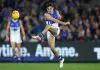 Kangaroos duo dropped following Fremantle disaster MELBOURNE, AUSTRALIA - MAY 04: Zac Fisher of the Kangaroos kicks the ball during the 2024 AFL Round 08 match between the St Kilda Saints and the North Melbourne Kangaroos at Marvel Stadium on May 04, 2024 in Melbourne, Australia. (Photo by Michael Willson/AFL Photos via Getty Images)