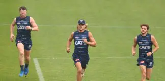 GEELONG, AUSTRALIA - FEBRUARY 19: Patrick Dangerfield, Bailey Smith and Oliver Wiltshire of the Cats trains during a Geelong Cats AFL training session at GMHBA Stadium on February 19, 2025 in Geelong, Australia. (Photo by Morgan Hancock/Getty Images)