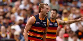 ADELAIDE, AUSTRALIA - MARCH 16: Jordan Dawson of the Crows celebrates a goal during the 2025 AFL Round 01 match between the Adelaide Crows and the St Kilda Saints at Adelaide Oval on March 16, 2025 in Adelaide, Australia. (Photo by Michael Willson/AFL Photos via Getty Images)
