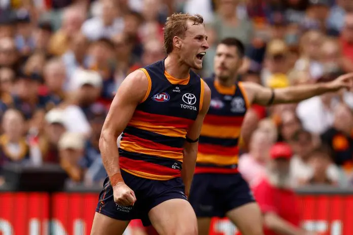 ADELAIDE, AUSTRALIA - MARCH 16: Jordan Dawson of the Crows celebrates a goal during the 2025 AFL Round 01 match between the Adelaide Crows and the St Kilda Saints at Adelaide Oval on March 16, 2025 in Adelaide, Australia. (Photo by Michael Willson/AFL Photos via Getty Images)