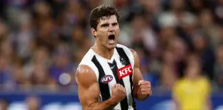 MELBOURNE, AUSTRALIA - MARCH 21: Lachie Schultz of the Magpies celebrates a goal during the 2025 AFL Round 02 match between the Footscray Bulldogs and the Collingwood Magpies at the Melbourne Cricket Ground on March 21, 2025 in Melbourne, Australia. (Photo by Michael Willson/AFL Photos via Getty Images)