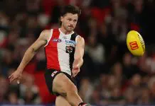 MELBOURNE, AUSTRALIA - MARCH 22: Jack Sinclair of the Saints kicks the ball during the round two AFL match between St Kilda Saints and Geelong Cats at Marvel Stadium, on March 22, 2025, in Melbourne, Australia. (Photo by Robert Cianflone/Getty Images)