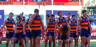 GOLD COAST, AUSTRALIA - APRIL 05: The Adelaide Crows look dejected as they exit the field following the 2025 AFL Round 04 match between the Gold Coast Suns and the Adelaide Crows at People First Stadium on April 5, 2025 in the Gold Coast, Australia. (Photo by Russell Freeman/AFL Photos via Getty Images)