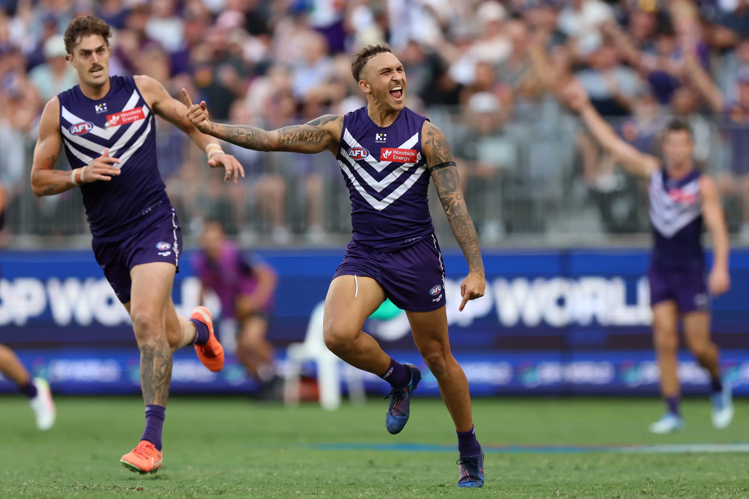 PERTH, AUSTRALIA - APRIL 06: Shai Bolton of the Dockers celebrates a goal during the 2025 AFL Round 04 match between the Fremantle Dockers and the Western Bulldogs at Optus Stadium on April 6, 2025 in Perth, Australia. (Photo by Janelle St Pierre/AFL Photos via Getty Images)