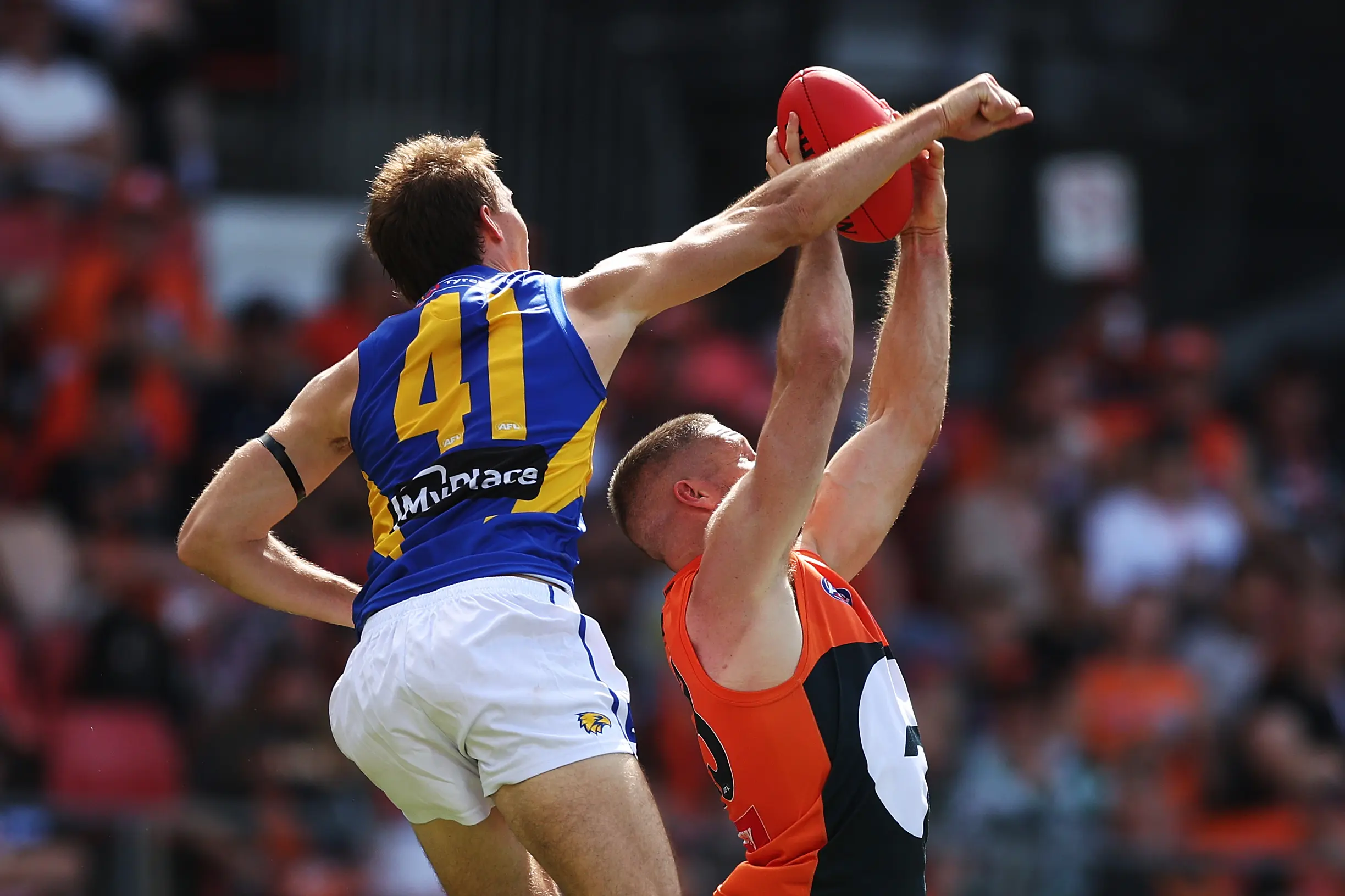 SYDNEY, AUSTRALIA - APRIL 06: Jesse Hogan of the Giants takes a contested mark during the round four AFL match between GWS Giants and West Coast Eagles at ENGIE Stadium, on April 06, 2025, in Sydney, Australia. (Photo by Mark Metcalfe/AFL Photos/via Getty Images)
