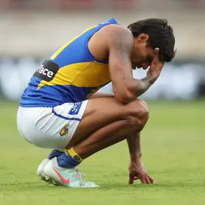 SYDNEY, AUSTRALIA - APRIL 06: Tim Kelly of the Eagles reacts after defeat during the round four AFL match between GWS Giants and West Coast Eagles at ENGIE Stadium, on April 06, 2025, in Sydney, Australia. (Photo by Mark Metcalfe/AFL Photos/via Getty Images)