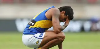 SYDNEY, AUSTRALIA - APRIL 06: Tim Kelly of the Eagles reacts after defeat during the round four AFL match between GWS Giants and West Coast Eagles at ENGIE Stadium, on April 06, 2025, in Sydney, Australia. (Photo by Mark Metcalfe/AFL Photos/via Getty Images)