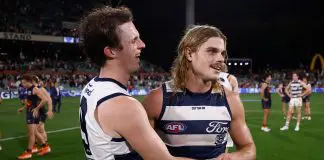 ADELAIDE, AUSTRALIA - APRIL 10: Max Holmes (left) and Bailey Smith of the Cats celebrate during the 2025 AFL Round 05 match between the Adelaide Crows and the Geelong Cats at Adelaide Oval on April 10, 2025 in Adelaide, Australia. (Photo by Michael Willson/AFL Photos via Getty Images)