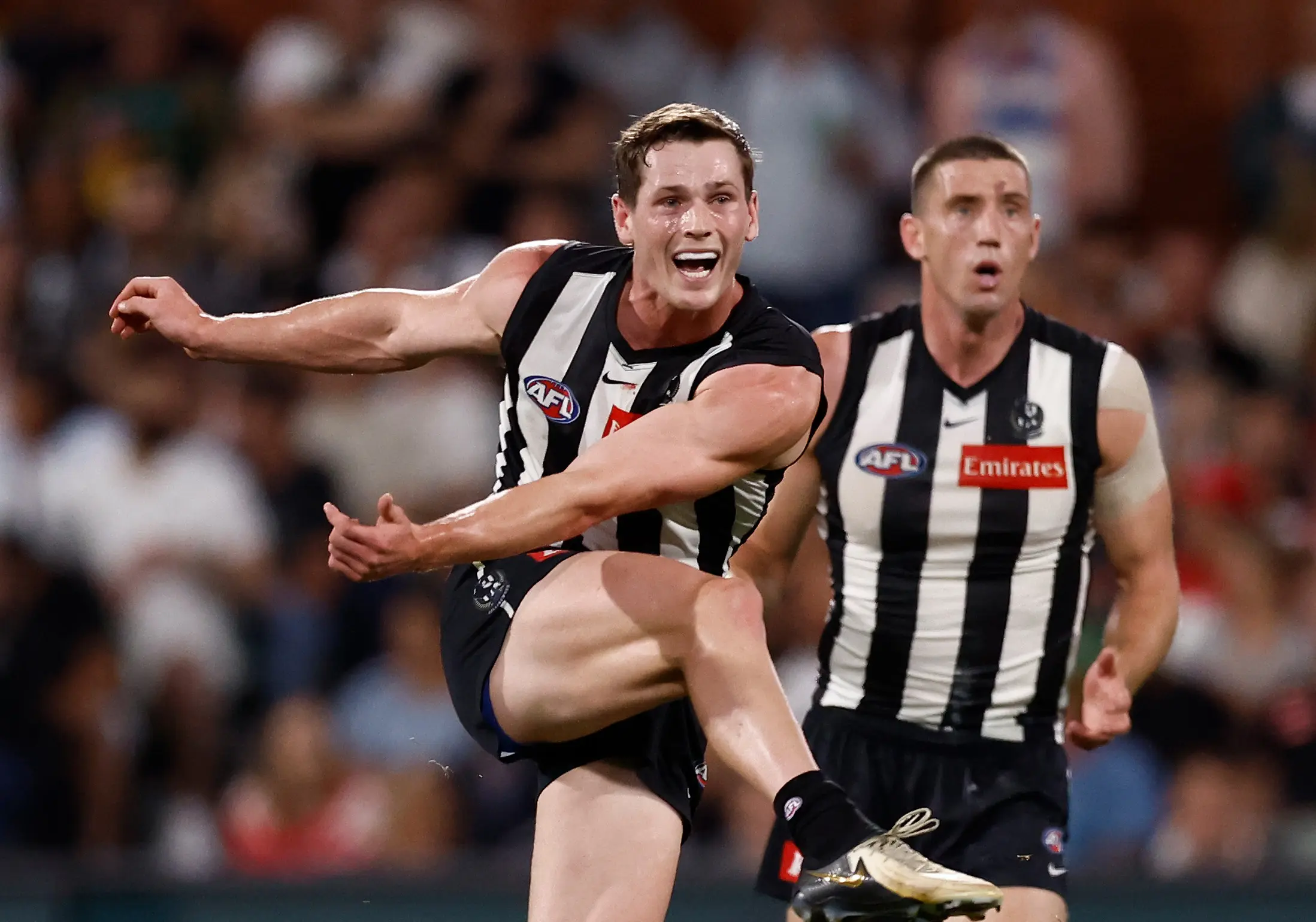ADELAIDE, AUSTRALIA - APRIL 11: Ned Long of the Magpies kicks the ball during the 2025 AFL Round 05 match between the Collingwood Magpies and the Sydney Swans at Adelaide Oval on April 11, 2025 in Adelaide, Australia. (Photo by Michael Willson/AFL Photos via Getty Images)