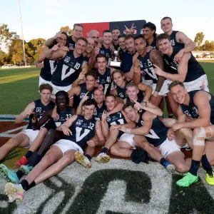 TANUNDA, AUSTRALIA - APRIL 12: The VFL team celebrate the win during the 2025 AAMI State Men's Game between SANFL and VFL at Tanunda Recreation Park on April 12, 2025 in Tanunda, Australia. (Photo by Kelly Barnes/AFL Photos/via Getty Images)