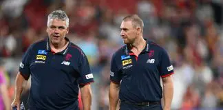 ADELAIDE, AUSTRALIA - APRIL 12: Simon Goodwin, Coach of the Demons looks on after the loss during the round five AFL match between Melbourne Demons and Essendon Bombers at Adelaide Oval, on April 12, 2025, in Adelaide, Australia. (Photo by Quinn Rooney/Getty Images)
