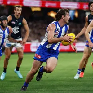 MELBOURNE, AUSTRALIA - APRIL 18: George Wardlaw of the Kangaroos in action during the 2025 AFL Round 06 match between the North Melbourne Kangaroos and the Carlton Blues at Marvel Stadium on April 18, 2025 in Melbourne, Australia. (Photo by Michael Willson/AFL Photos via Getty Images)