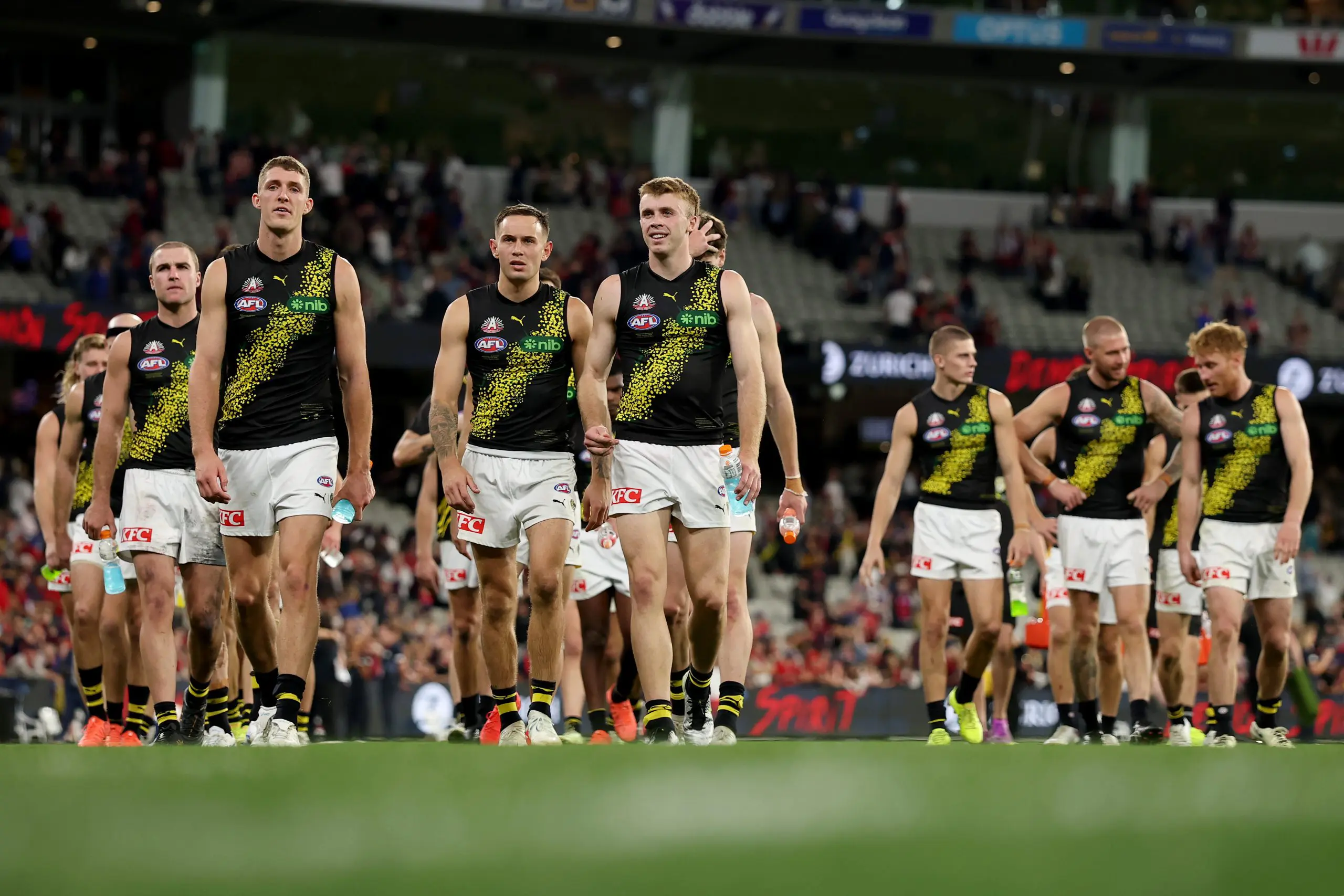 MELBOURNE, AUSTRALIA - APRIL 24: The Tigers look dejected after losing the round seven AFL match between Melbourne Demons and Richmond Tigers at Melbourne Cricket Ground, on April 24, 2025, in Melbourne, Australia. (Photo by Robert Cianflone/Getty Images)