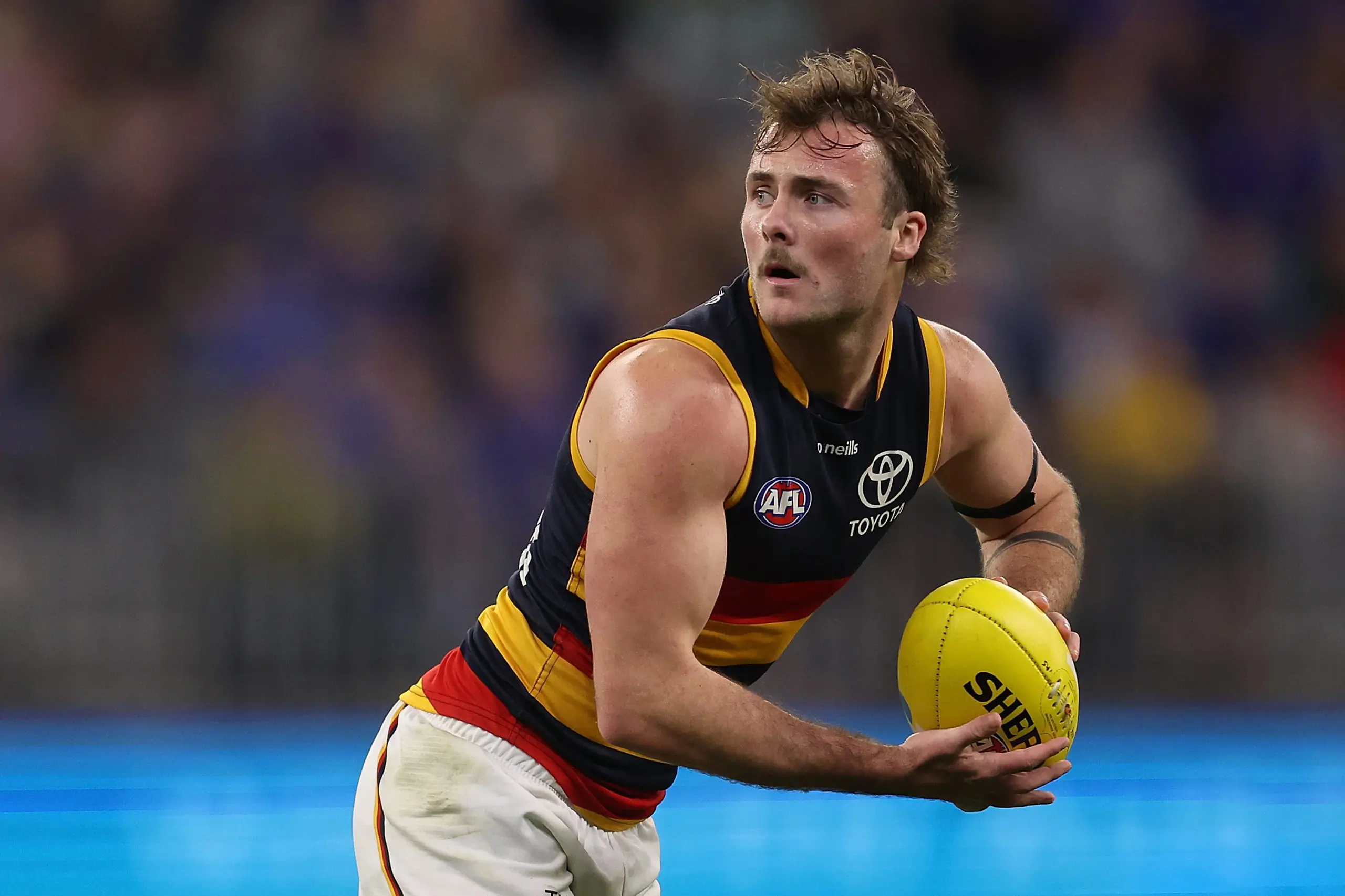 PERTH, AUSTRALIA - AUGUST 26: Luke Pedlar of the Crows in action during the round 24 AFL match between the West Coast Eagles and Adelaide Crows at Optus Stadium, on August 26, 2023, in Perth, Australia. (Photo by Paul Kane/Getty Images)