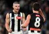 MELBOURNE, AUSTRALIA - JUNE 16: Lachie Schultz of the Magpies is congratulated by Lachlan Sullivan after kicking a goal during the round 14 AFL match between North Melbourne Kangaroos and Collingwood Magpies at Marvel Stadium, on June 16, 2024, in Melbourne, Australia. (Photo by Josh Chadwick/AFL Photos/Getty Images)