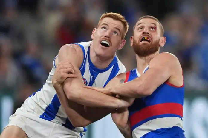 MELBOURNE, AUSTRALIA - JUNE 29: Toby Pink of the Kangaroos and Liam Jones of the Bulldogs compete during the round 16 AFL match between North Melbourne Kangaroos and Western Bulldogs at Marvel Stadium, on June 29, 2024, in Melbourne, Australia. (Photo by Daniel Pockett/Getty Images)