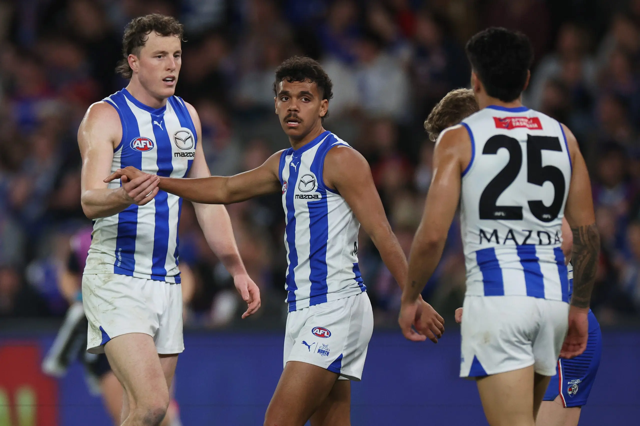 MELBOURNE, AUSTRALIA - AUGUST 18: Robert Hansen Jr of the Kangaroos zcduring the round 23 AFL match between Western Bulldogs and North Melbourne Kangaroos at Marvel Stadium, on August 18, 2024, in Melbourne, Australia. (Photo by Daniel Pockett/Getty Images)