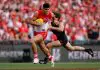 SYDNEY, AUSTRALIA - SEPTEMBER 07: Lewis Melican of the Swans evades Callan Ward of the Giants during the 2024 AFL First Qualifying Final match between the Sydney Swans and the GWS GIANTS at The Sydney Cricket Ground on September 07, 2024 in Sydney, Australia. (Photo by Dylan Burns/AFL Photos via Getty Images)