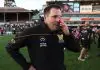 MELBOURNE, AUSTRALIA - SEPTEMBER 22: An emotional Werribee coach Jimmy Allan celebrates after winning the 2024 VFL Grand Final match between Werribee and the Southport Sharks at IKON Park on September 22, 2024 in Melbourne, Australia. (Photo by Rob Lawson/AFL Photos via Getty Images)