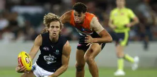 CANBERRA, AUSTRALIA - FEBRUARY 28: Nick Haynes of the Blues handballs during the 2025 AAMI AFL Community Series match between Greater Western Sydney Giants and Carlton Blues at Manuka Oval on February 28, 2025 in Canberra, Australia. (Photo by Darrian Traynor/Getty Images)