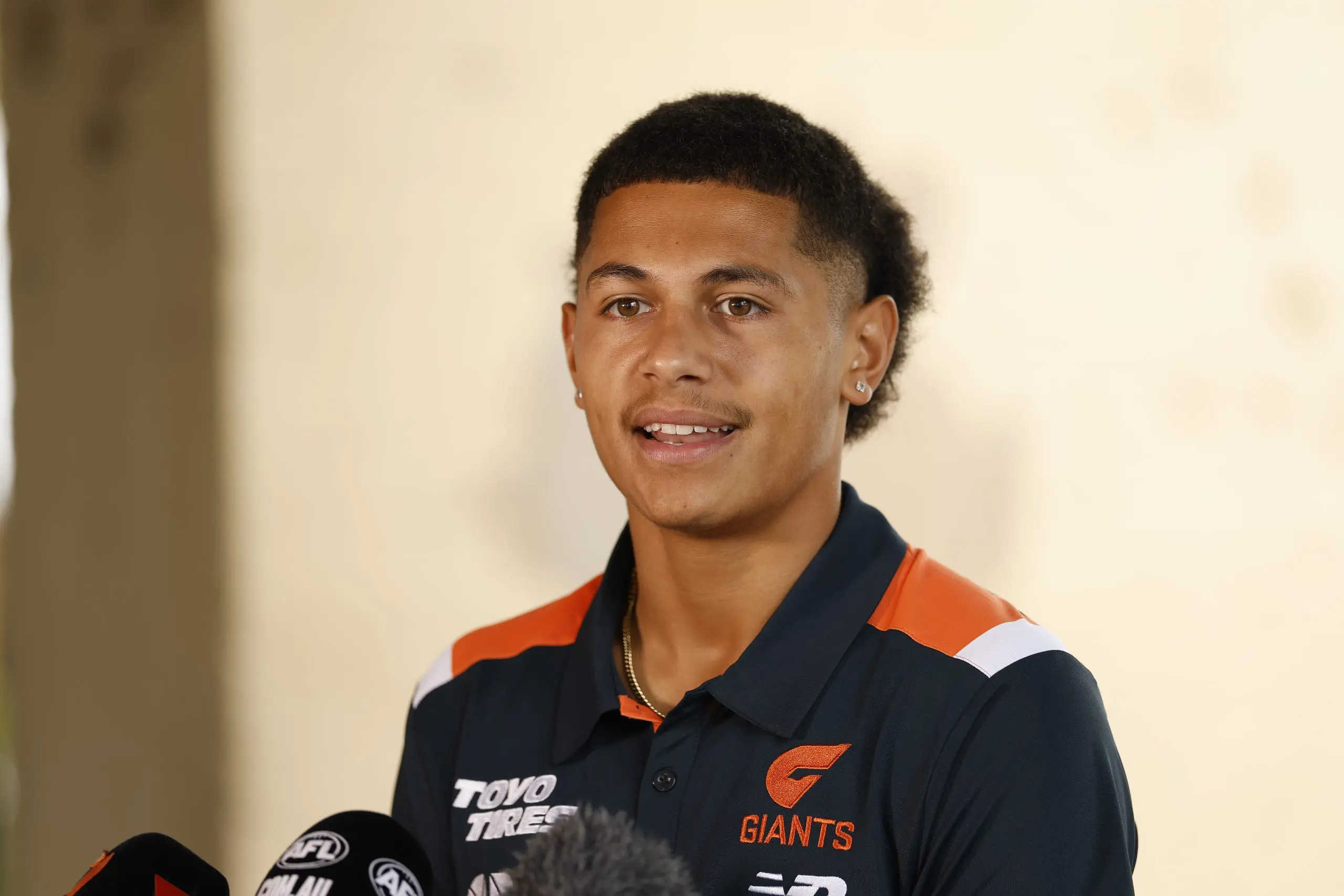 SYDNEY, AUSTRALIA - MARCH 04: Josaia Delana of the Giants speaks to the media during the Western Sydney 2025 AFL Opening Round media opportunity at North Rocks Public School on March 04, 2025 in Sydney, Australia. (Photo by Darrian Traynor/AFL Photos/via Getty Images)