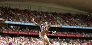 SYDNEY, AUSTRALIA - MARCH 09: Jamie Elliott of the Magpies kick a goal during the AFL Opening Round match between Greater Western Sydney Giants and Collingwood Magpies at ENGIE Stadium, on March 09, 2025, in Sydney, Australia. (Photo by Darrian Traynor/Getty Images)