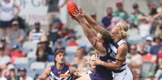 GEELONG, AUSTRALIA - MARCH 15: Sam De Koning of the Cats spoils Josh Treacy of the Dockers during the round one AFL match between Geelong Cats and Fremantle Dockers at GMHBA Stadium, on March 15, 2025, in Geelong, Australia. (Photo by Daniel Pockett/Getty Images)