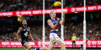 FINAL TEAMS: Bulldogs vs Essendon – Round 4, 2026 MELBOURNE, AUSTRALIA - MARCH 28: Josh Dolan of the Bulldogs marks the ball during the 2025 AFL Round 03 match between the Carlton Blues and the Western Bulldogs at Marvel Stadium on March 28, 2025 in Melbourne, Australia. (Photo by Michael Willson/AFL Photos via Getty Images)