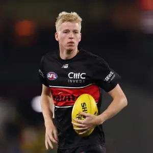 MELBOURNE, AUSTRALIA - MARCH 29: Tobie Travaglia of the Saints warms up ahead of the round three AFL match between St Kilda Saints and Richmond Tigers at Marvel Stadium, on March 29, 2025, in Melbourne, Australia. (Photo by Morgan Hancock/AFL Photos/via Getty Images)