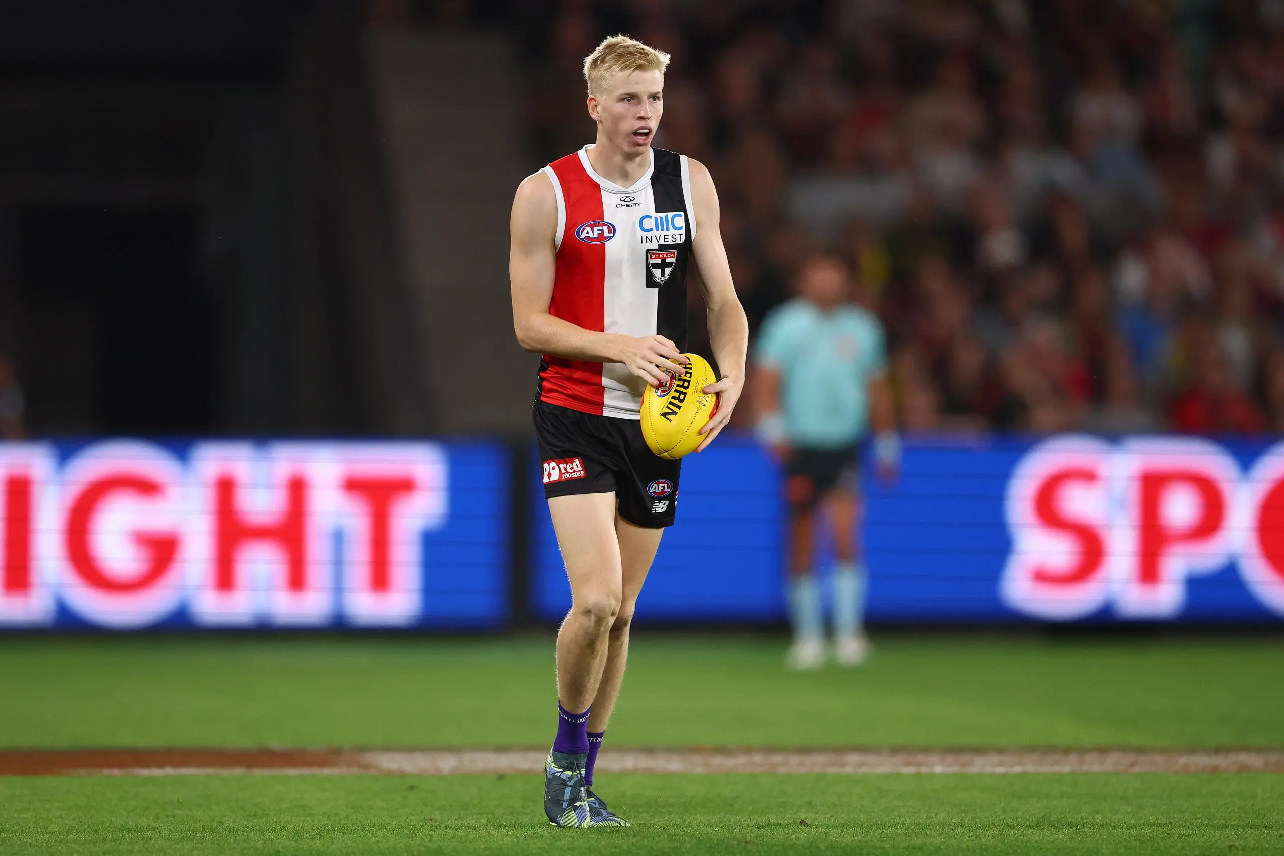 MELBOURNE, AUSTRALIA - MARCH 29: Tobie Travaglia of the Saints takes possession of the ball during the round three AFL match between St Kilda Saints and Richmond Tigers at Marvel Stadium, on March 29, 2025, in Melbourne, Australia. (Photo by Morgan Hancock/AFL Photos/via Getty Images)