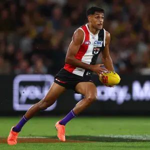 MELBOURNE, AUSTRALIA - MARCH 29: Nasiah Wanganeen-Milera of the Saints runs with the ball during the round three AFL match between St Kilda Saints and Richmond Tigers at Marvel Stadium, on March 29, 2025, in Melbourne, Australia. (Photo by Morgan Hancock/AFL Photos/via Getty Images)