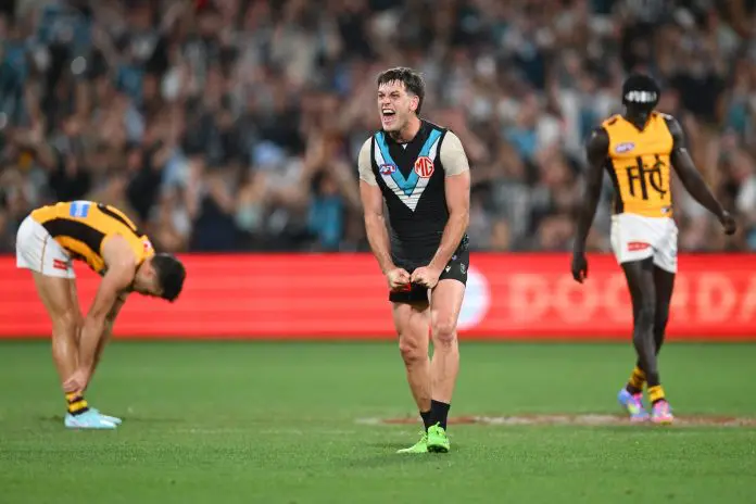 ADELAIDE, AUSTRALIA - APRIL 13: Zak Butters of the Power celebrates at full time during the round five AFL match between Port Adelaide Power and Hawthorn Hawks at Adelaide Oval, on April 13, 2025, in Adelaide, Australia. (Photo by Quinn Rooney/Getty Images)