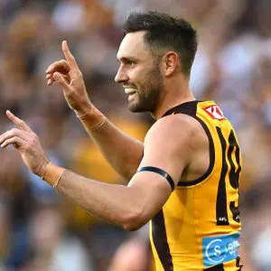 MELBOURNE, AUSTRALIA - APRIL 21: Jack Gunston of the Hawks celebrates kicking a goal during the round six AFL match between Geelong Cats and Hawthorn Hawks at Melbourne Cricket Ground, on April 21, 2025, in Melbourne, Australia. (Photo by Quinn Rooney/Getty Images)