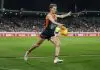CANBERRA, AUSTRALIA - APRIL 26: Lachie Whitfield of the Giants kicks the ball during the round seven AFL match between GWS Giants and Western Bulldogs at Manuka Oval, on April 26, 2025, in Canberra, Australia. (Photo by Darrian Traynor/Getty Images)