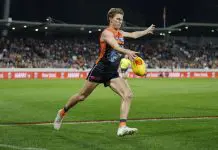 CANBERRA, AUSTRALIA - APRIL 26: Lachie Whitfield of the Giants kicks the ball during the round seven AFL match between GWS Giants and Western Bulldogs at Manuka Oval, on April 26, 2025, in Canberra, Australia. (Photo by Darrian Traynor/Getty Images)