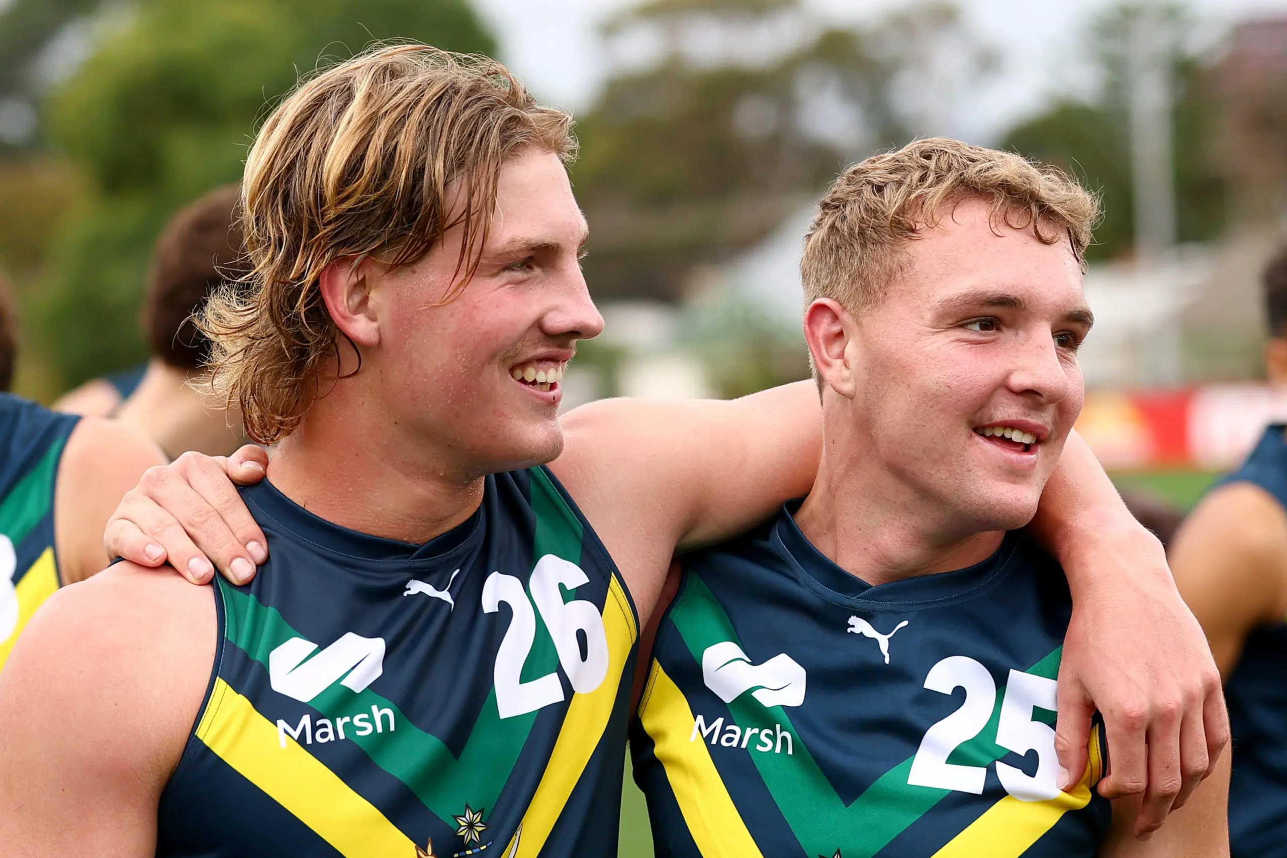 MELBOURNE, AUSTRALIA - APRIL 27: Oliver Greeves and Koby Evans of the AFL National Academy celebrate winning the Marsh AFL National Academy Boys match between Australia U18 and Coburg VFL at Whitten Oval on April 27, 2025 in Melbourne, Australia. (Photo by Josh Chadwick/AFL Photos/via Getty Images)
