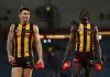 MELBOURNE, AUSTRALIA - APRIL 27: Josh Battle and Mabior Chol of the Hawks celebrate victory following the round seven AFL match between Hawthorn Hawks and West Coast Eagles at Marvel Stadium, on April 27, 2025, in Melbourne, Australia. (Photo by Morgan Hancock/Getty Images)