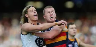 ADELAIDE, AUSTRALIA - MAY 03: Tom De Koning of the Blues and Reilly O'Brien of the Crows during the 2025 AFL Round 08 match between the Adelaide Crows and the Carlton Blues at Adelaide Oval on May 3, 2025 in Adelaide, Australia. (Photo by Sarah Reed/AFL Photos via Getty Images)