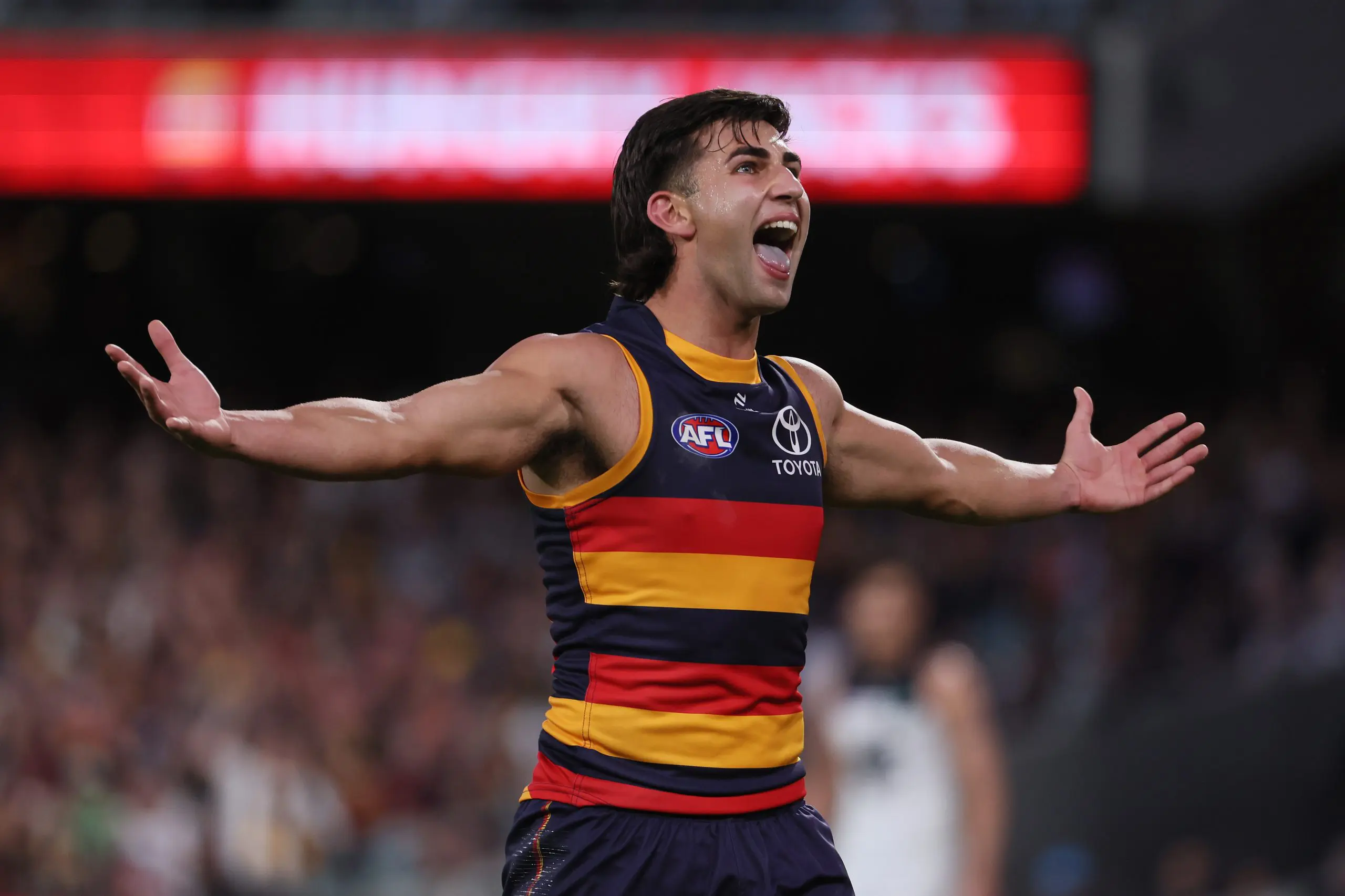 ADELAIDE, AUSTRALIA - MAY 03: Josh Rachele of the Crows celebrates a goal during the 2025 AFL Round 08 match between the Adelaide Crows and the Carlton Blues at Adelaide Oval on May 3, 2025 in Adelaide, Australia. (Photo by James Elsby/AFL Photos via Getty Images)