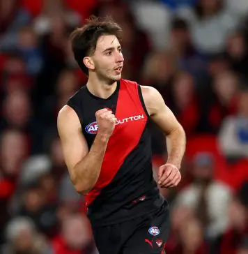 MELBOURNE, AUSTRALIA - MAY 01: Nic Martin of the Bombers celebrates kicking a goalduring the round eight AFL match between Essendon Bombers and North Melbourne Kangaroos at Marvel Stadium, on May 01, 2025, in Melbourne, Australia. (Photo by Josh Chadwick/Getty Images)