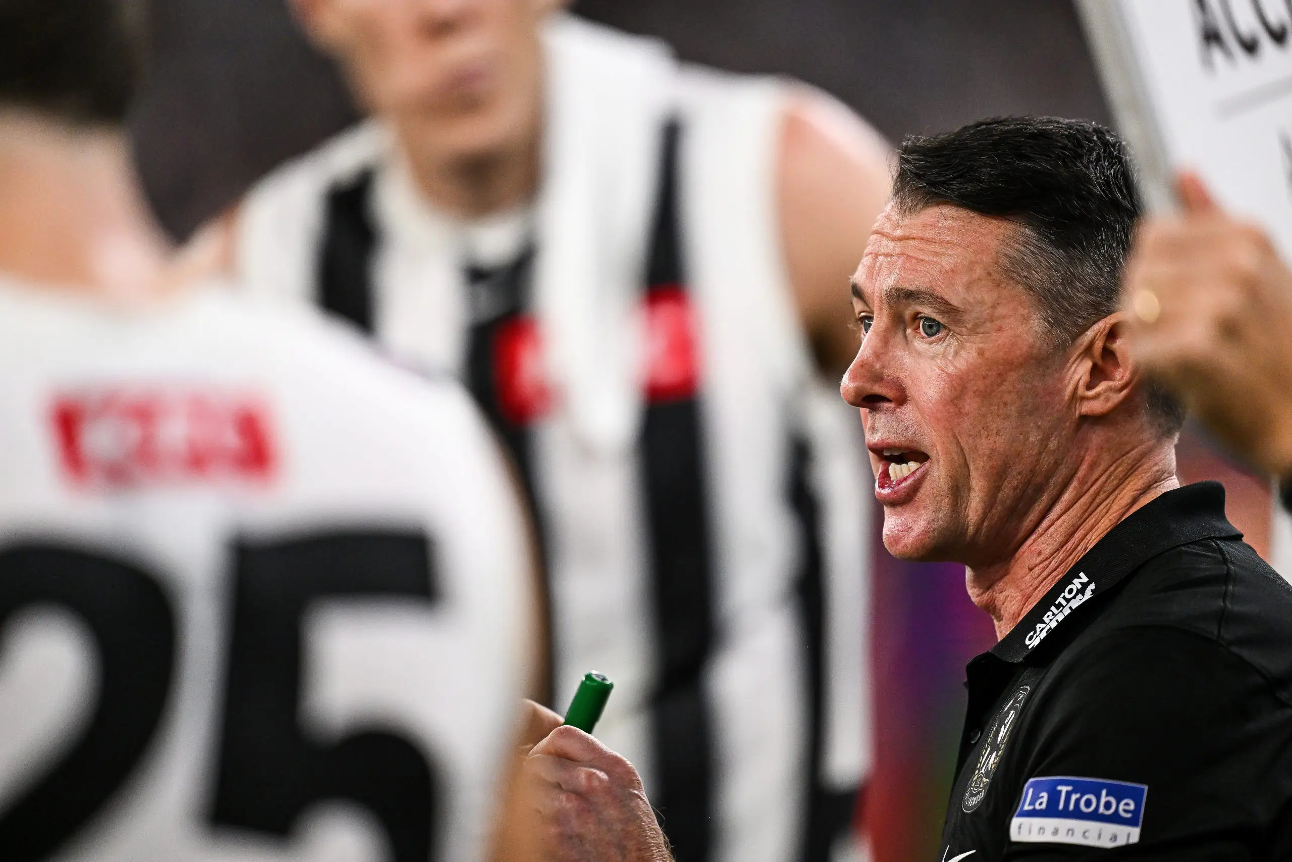 PERTH, AUSTRALIA - MAY 08: Craig McRae, Senior Coach of the Magpies addresses the players at the break during the 2025 AFL Round 09 match between the Fremantle Dockers and the Collingwood Magpies at Optus Stadium on May 8, 2025 in Perth, Australia. (Photo by Daniel Carson/AFL Photos via Getty Images)