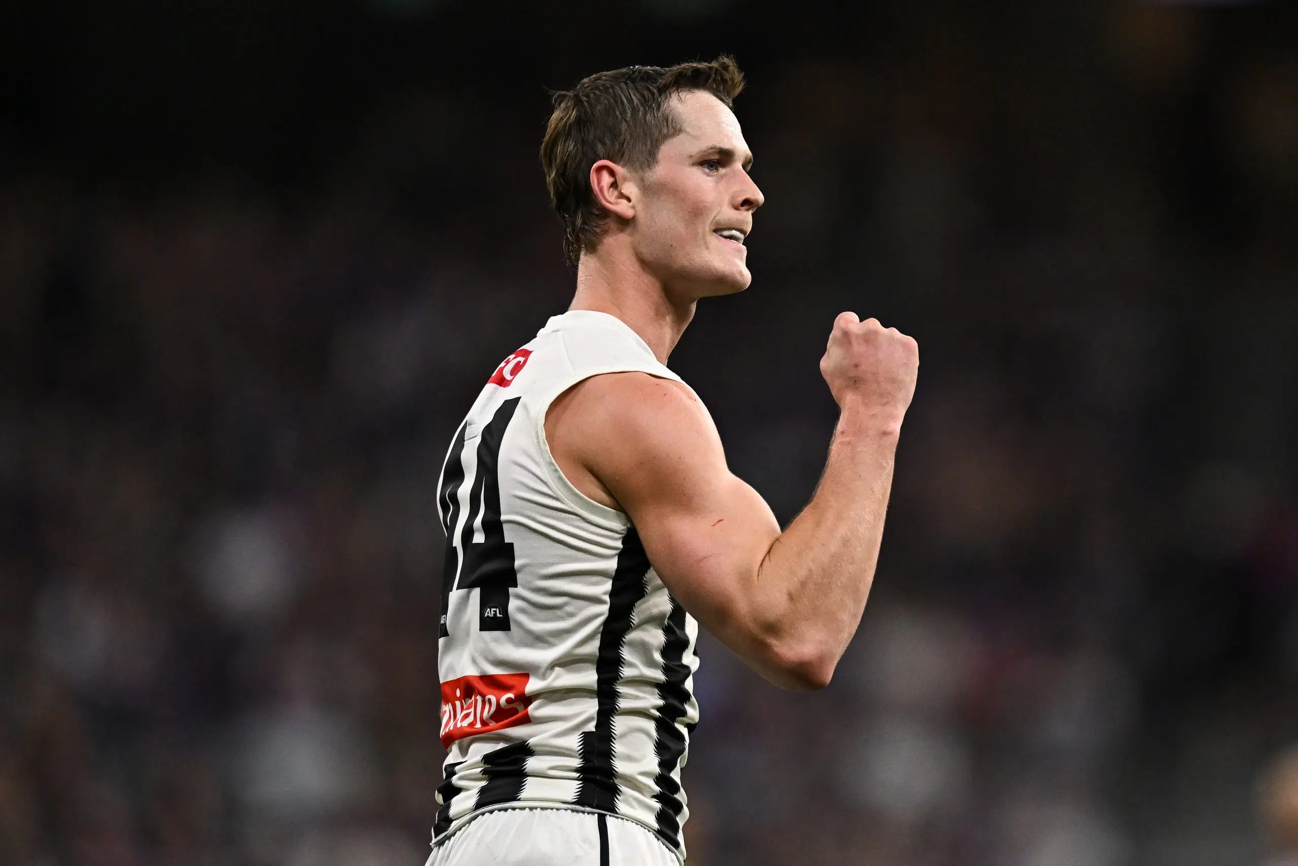 PERTH, AUSTRALIA - MAY 08: Ned Long of the Magpies celebrates a goal during the 2025 AFL Round 09 match between the Fremantle Dockers and the Collingwood Magpies at Optus Stadium on May 8, 2025 in Perth, Australia. (Photo by Daniel Carson/AFL Photos via Getty Images)
