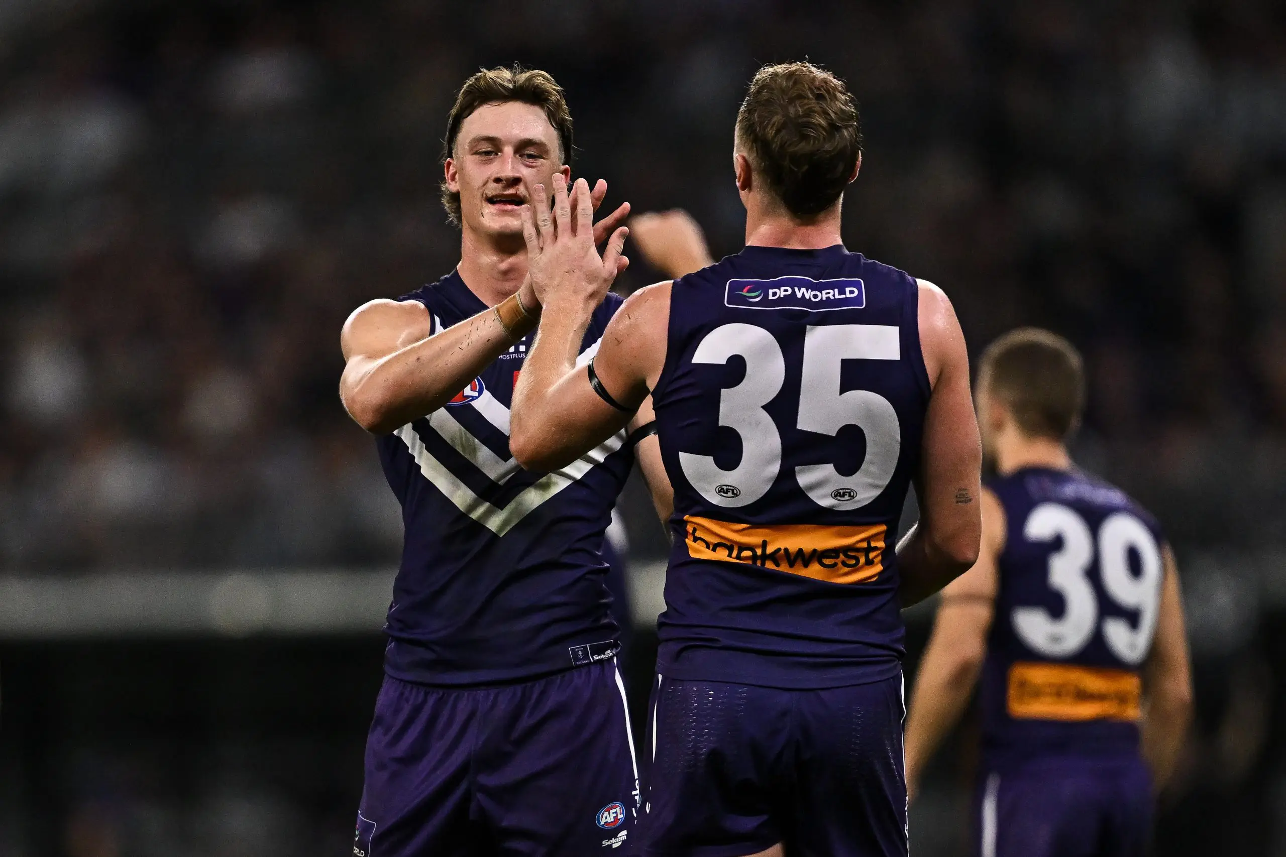 PERTH, AUSTRALIA - MAY 08: Jye Amiss of the Dockers celebrates a play during the 2025 AFL Round 09 match between the Fremantle Dockers and the Collingwood Magpies at Optus Stadium on May 8, 2025 in Perth, Australia. (Photo by Daniel Carson/AFL Photos via Getty Images)