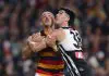 ADELAIDE, AUSTRALIA - MAY 10: Taylor Walker of the Crows and Dante Visentini of the Power during the 2025 AFL Round 09 match between the Port Adelaide Power and the Adelaide Crows at Adelaide Oval on May 10, 2025 in Adelaide, Australia. (Photo by Sarah Reed/AFL Photos via Getty Images)