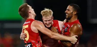 DARWIN, AUSTRALIA - MAY 10: (L-R) Noah Anderson, John Noble and Touk Miller of the Suns celebrate during the 2025 AFL Round 09 match between the Gold Coast Suns and the Western Bulldogs at TIO Stadium on May 10, 2025 in Darwin, Australia. (Photo by Michael Willson/AFL Photos via Getty Images)