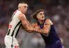 PERTH, AUSTRALIA - MAY 08: Darcy Cameron of the Magpies and Luke Jackson of the Dockers contest the ruck during the round nine AFL match between Fremantle Dockers and Collingwood Magpies at Optus Stadium, on May 08, 2025, in Perth, Australia. (Photo by Paul Kane/Getty Images)