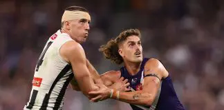 PERTH, AUSTRALIA - MAY 08: Darcy Cameron of the Magpies and Luke Jackson of the Dockers contest the ruck during the round nine AFL match between Fremantle Dockers and Collingwood Magpies at Optus Stadium, on May 08, 2025, in Perth, Australia. (Photo by Paul Kane/Getty Images)